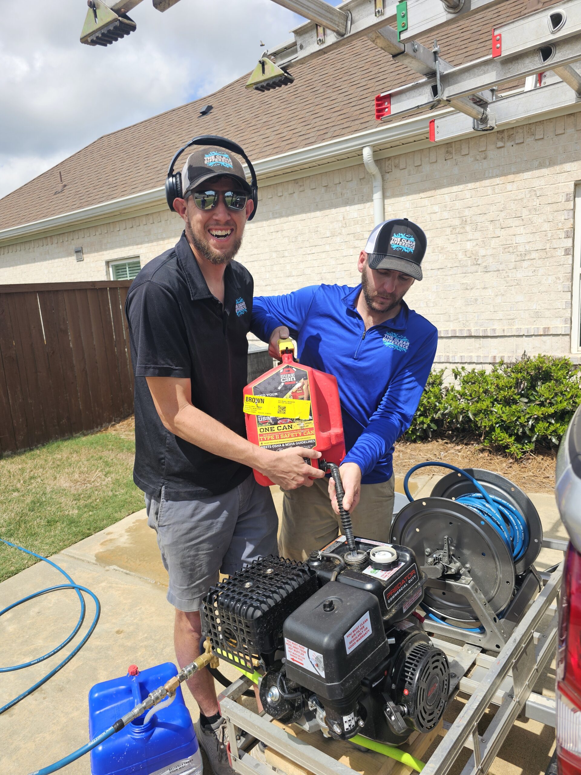 look how much fun they are having pressure washing this driveway in auburn al